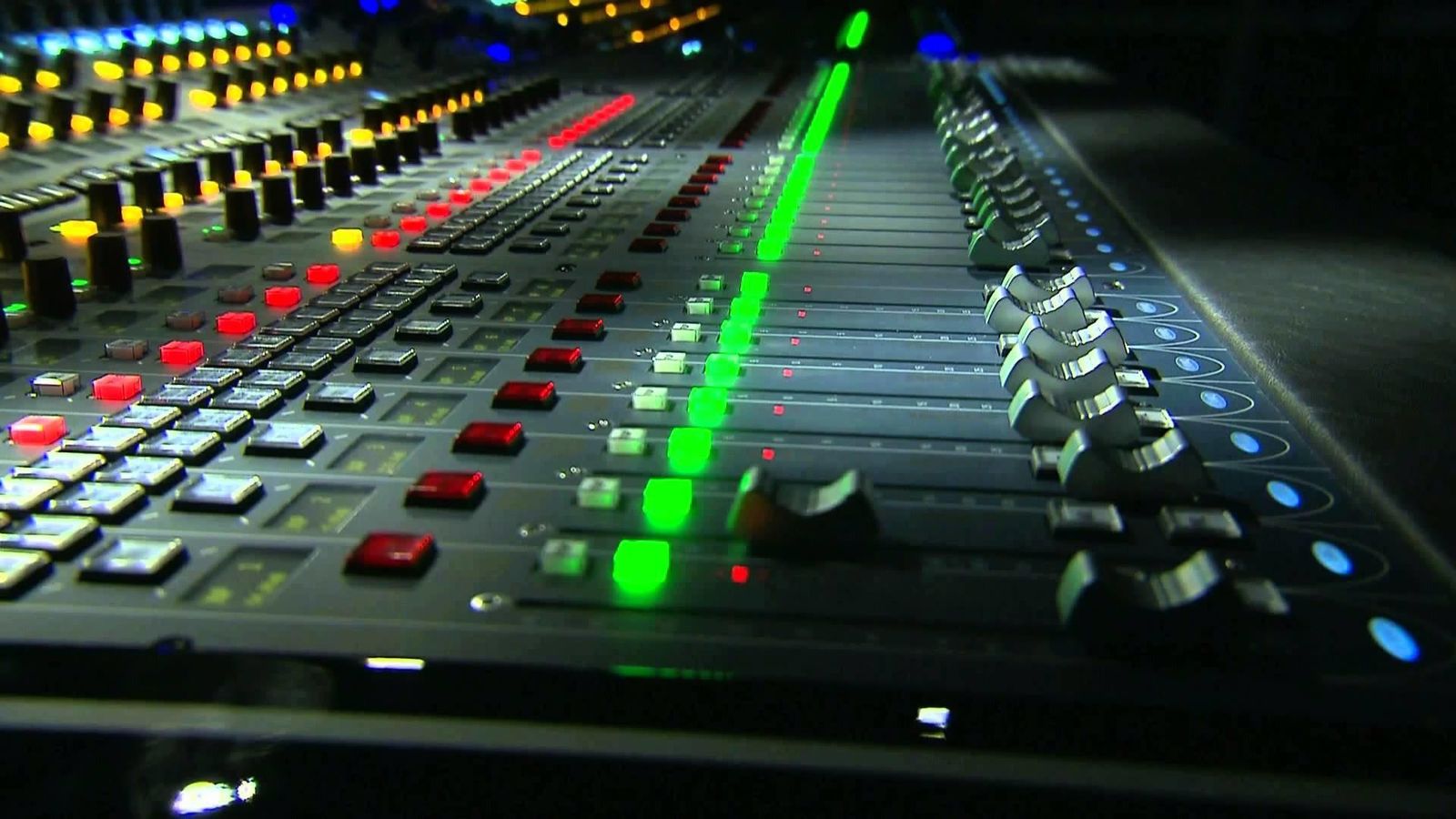 Console de mixage aux faders éclairés